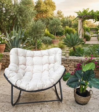 Sillón mecedora beige y negro