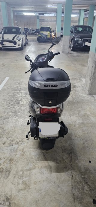 Sumco SJoy125 Scooter Azul y Negro