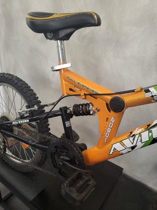 Bicicleta niño doble suspensión naranja, rodado 20
