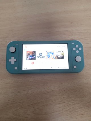 Nintendo Switch Lite + 5 Giochi + Custodia + Scatola