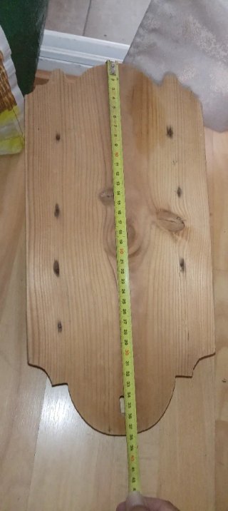 Mortero de madera y latón