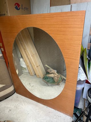 Espejo de madera ovalado