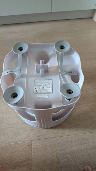 Asiento de baño para bebé con juguetes