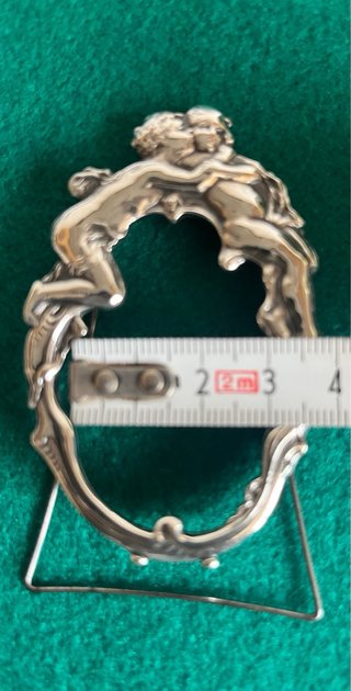 Marco ovale in argento massiccio con angeli