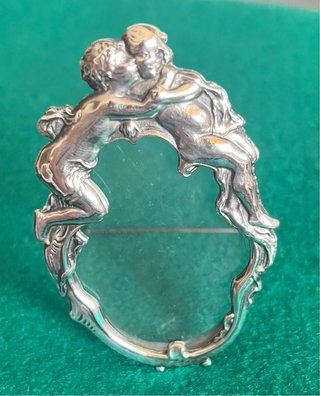 Marco ovale in argento massiccio con angeli
