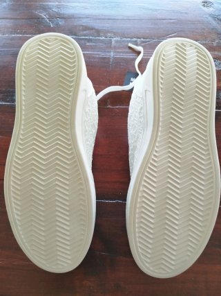 Zapatillas blancas de encaje