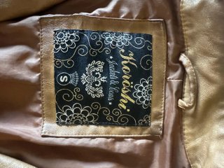 Chaqueta efecto piel marrón