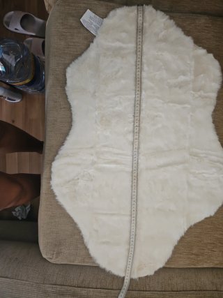 Alfombra felpuda blanca