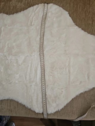 Alfombra felpuda blanca