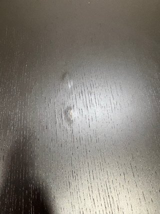 Mesa redonda de madera negra