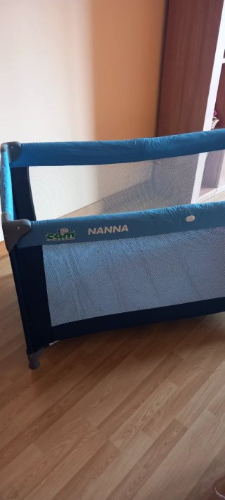 Cuna de viaje con colchón de muelles