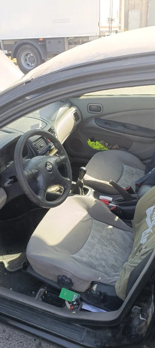 Nissan Almera 2001 - foto 1