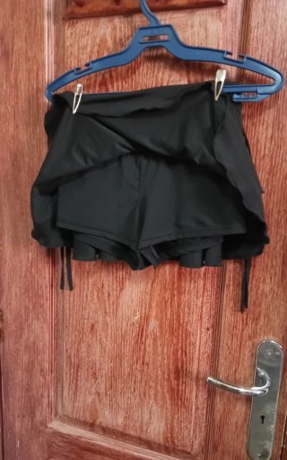 Falda pantalón negra volantes