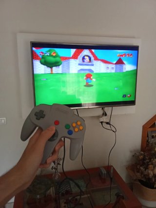 Nintendo 64 con controller e giochi