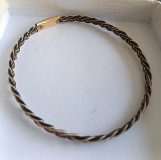 Pulsera antigua trenzada oro y negro
