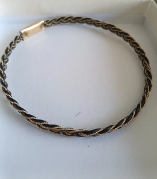 Pulsera antigua trenzada oro y negro