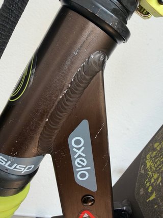 Monopatín OXELO Negro y Verde. (Decatlon)