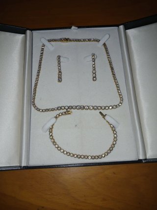 Conjunto de joyería de plata y oro