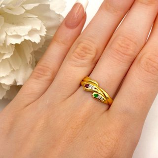 Anillo oro 18kt con rubí, esmeralda y circonita