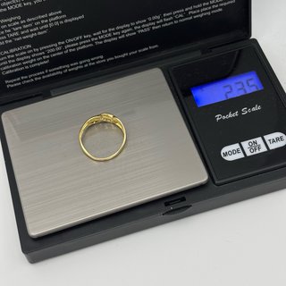 Anillo oro 18kt con rubí, esmeralda y circonita