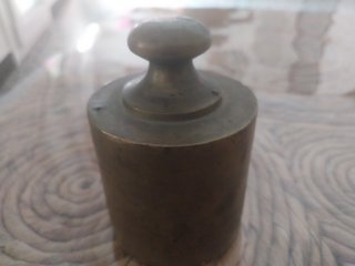Peso antiguo de latón