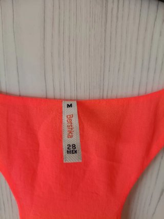 Top naranja neón tirantes