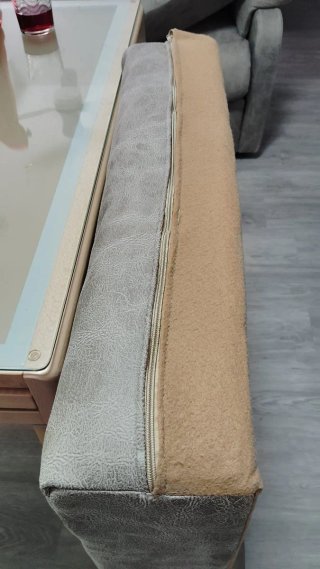 Sofá gris de tela