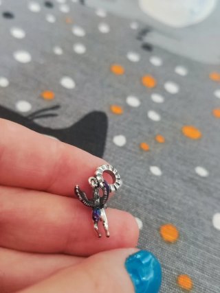 Charm unicornio con alas plata multicolor