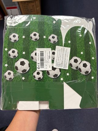 Cajas de dulces para fiesta de balon de futbol.