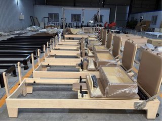 Reformer Pilates roble macizo con muelles coreanos