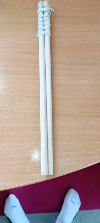 Diábolo y palos de madera