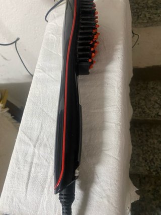 Spazzola riscaldante lisciante   per capelli