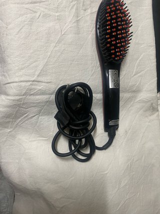 Spazzola riscaldante lisciante   per capelli