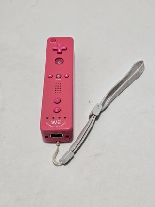 1 mando wii con Motion rosa original nintendo