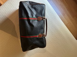 Bolsa de viaje Gucci negra