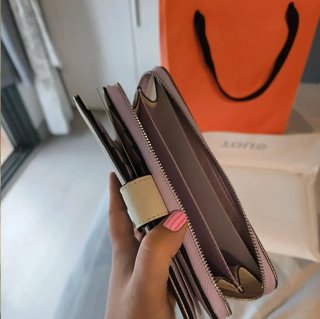 Monedero Tous plateado, interior lila