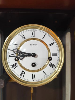 Reloj de péndulo Sars