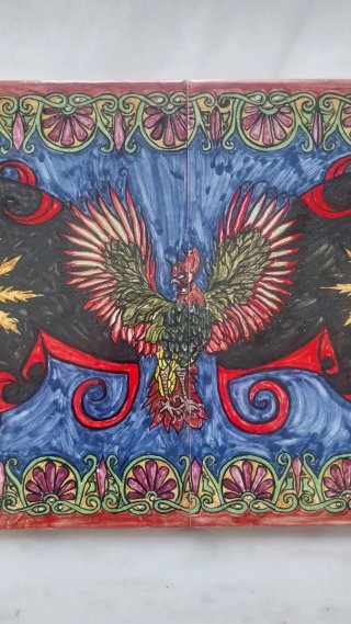 Azulejo decorativo con ave y motivos