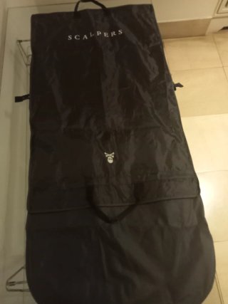 Fundas para trajes blancas y negras