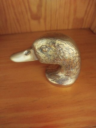 Antiguo abrebotellas cabeza de pato