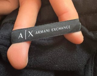 Pantaloni Armani Exchange neri con banda rossa
