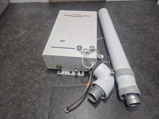 Calentador de gas Corberó blanco.