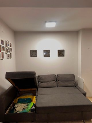 Sofá cama gris con canapé