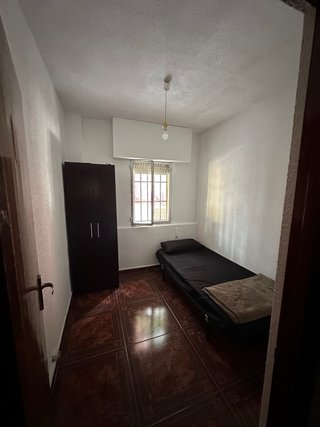 Habitación amueblada