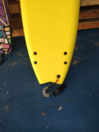 Tabla de surf amarilla