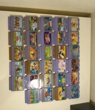 Consola portátil + 35 Cartuchos de juegos Vtech