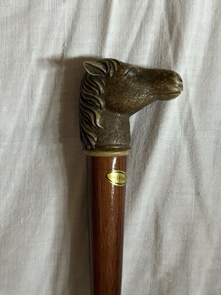 Calzador antiguo con mango de caballo