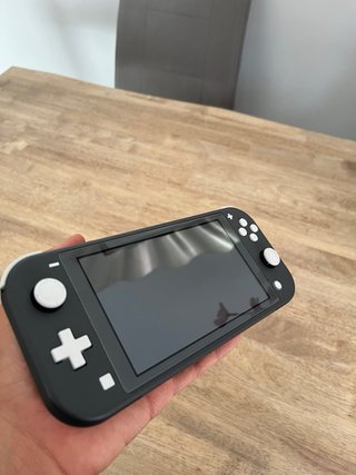 Nintendo Switch Lite + 4 Juegos nuevos