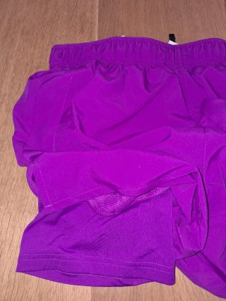 Pantalones cortos deportivos Nike morados