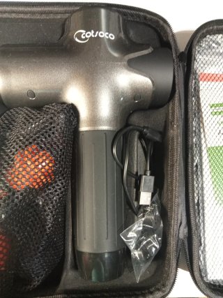 Pistola de masaje Cotsoco con bolsa y sin uso